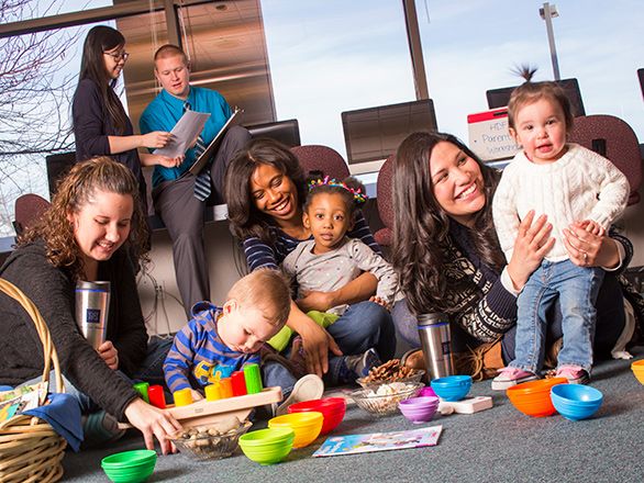 Group of parents and students in a classroom