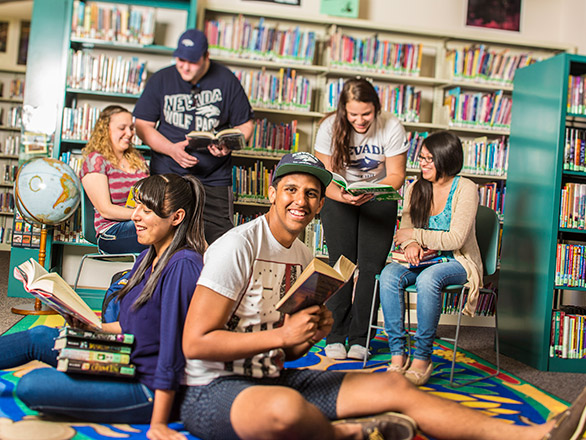 Students gather together in the library