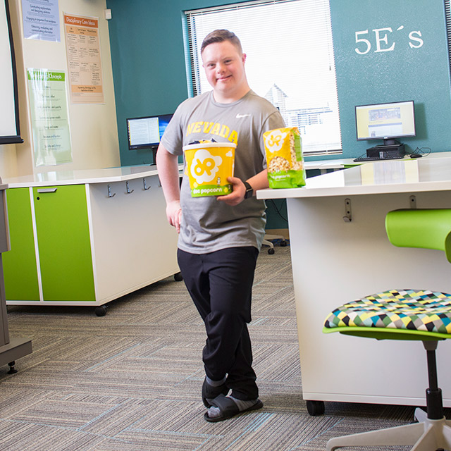 Student with popcorn in hand