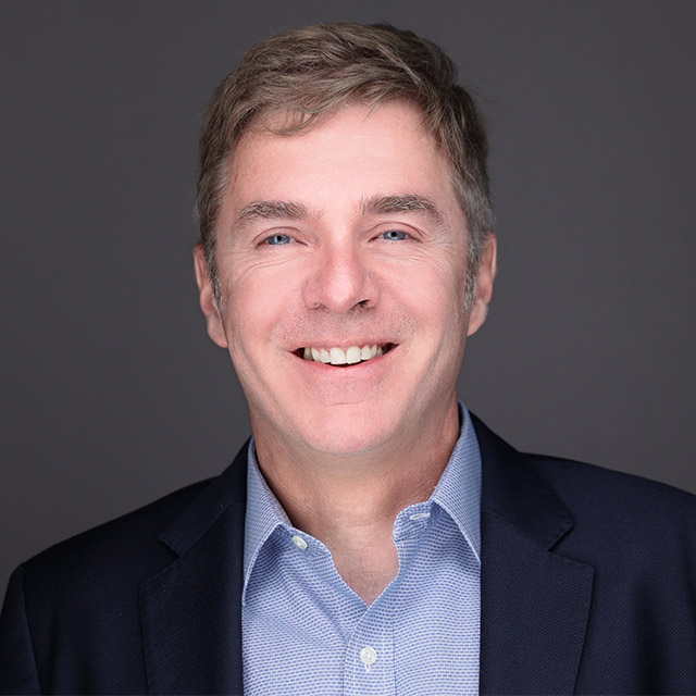 Head shot of Mark Precious.