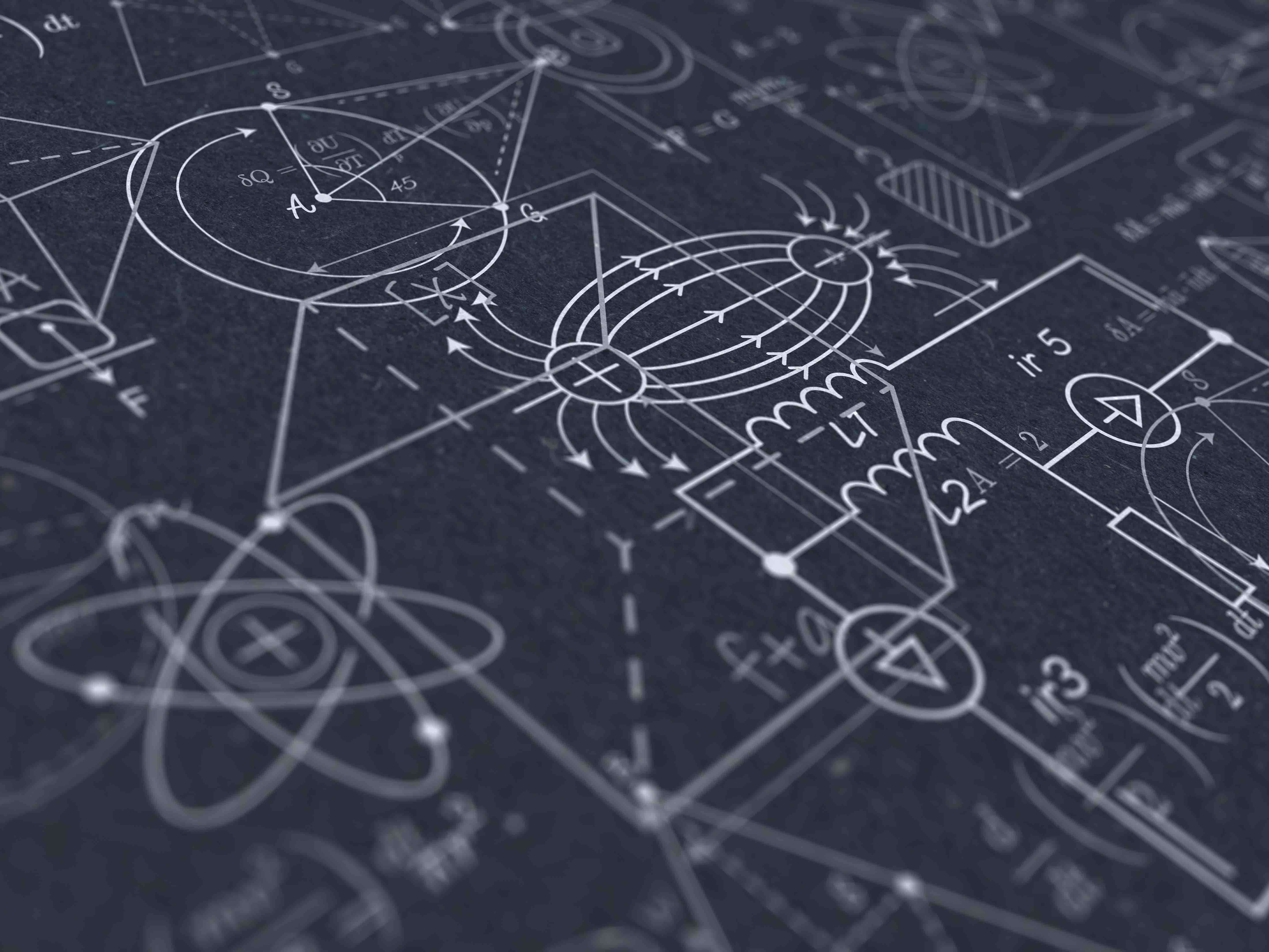 chalk board with equations on it