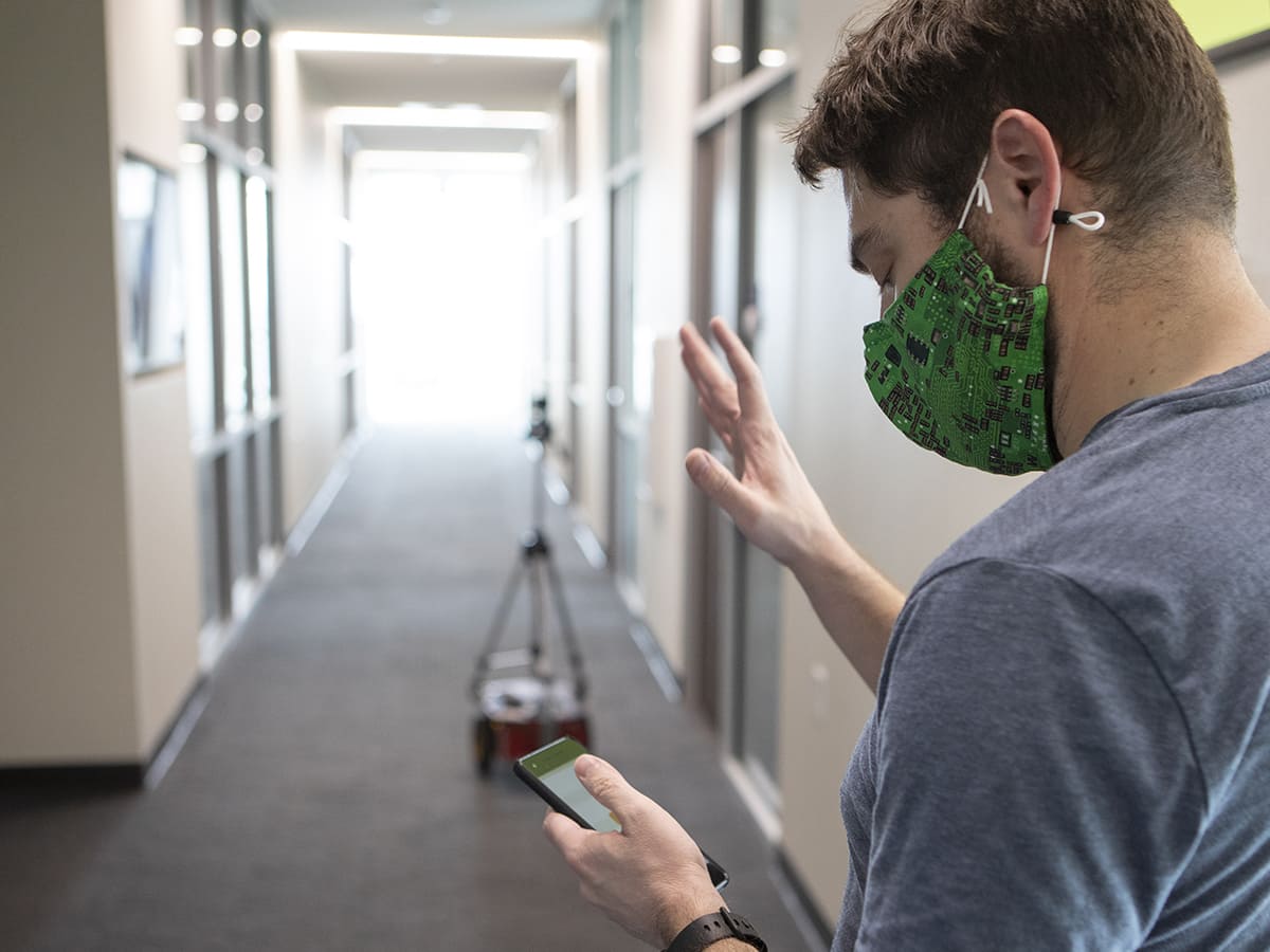 David Feil-Seifer navigating a robot in a hallway