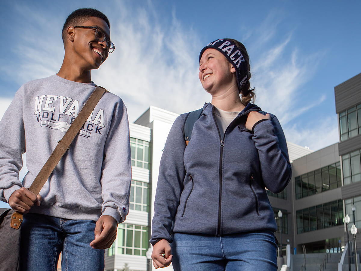 two students outside William N. Pennington Engineering Building