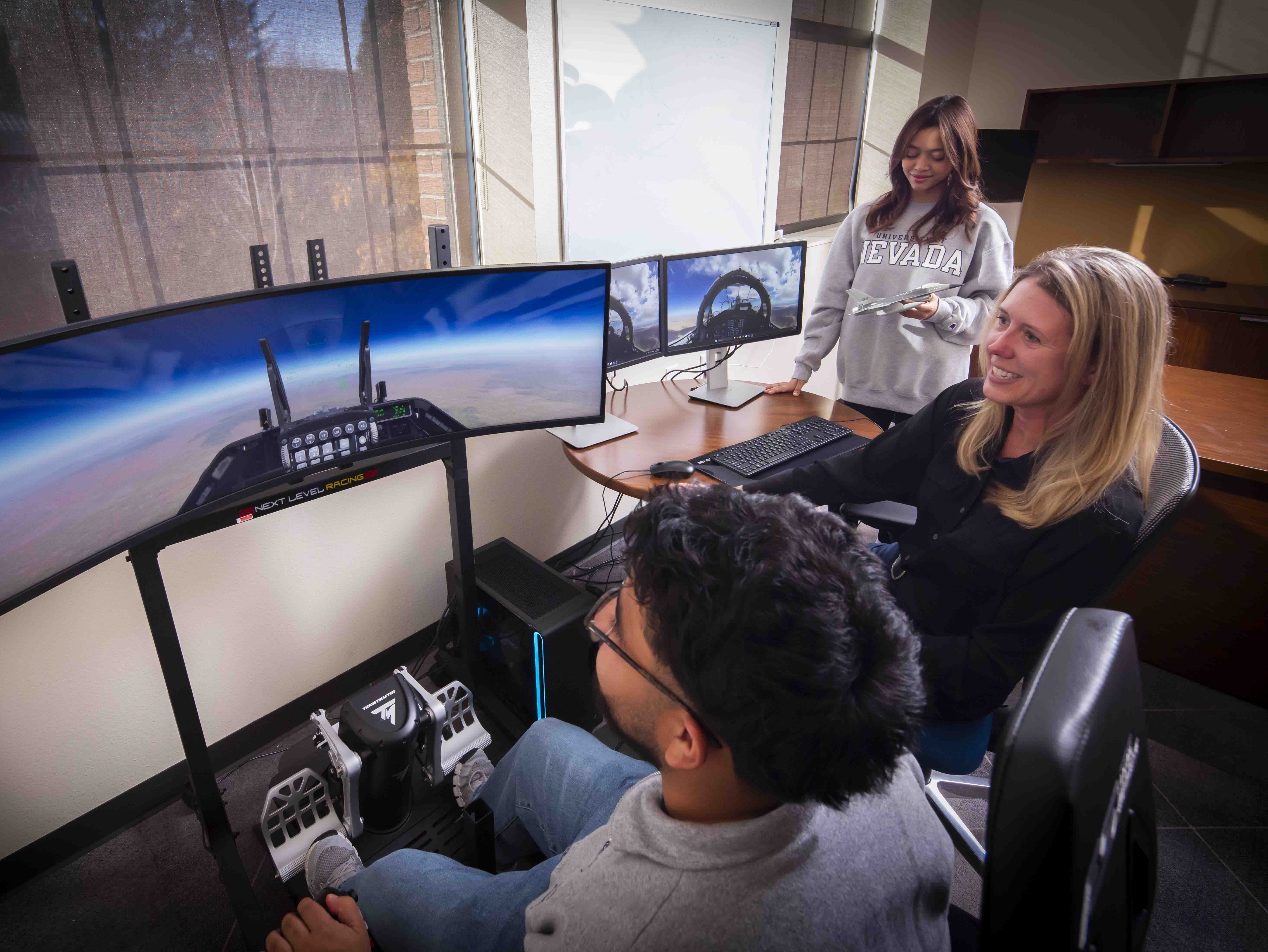 Students working in front of machinery
