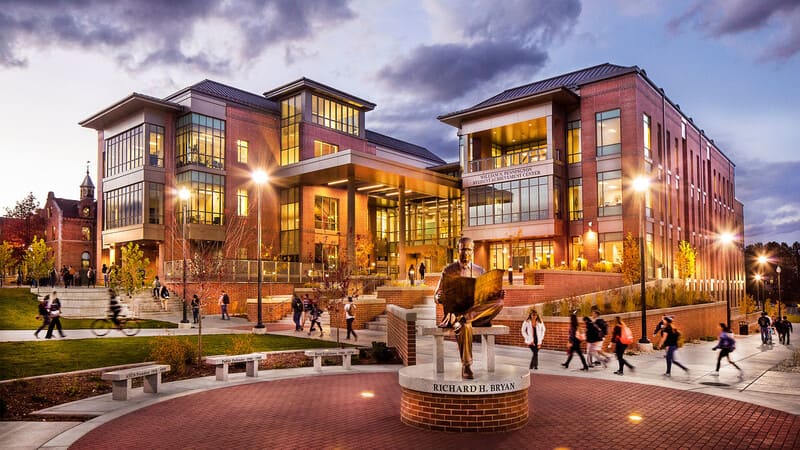 Pennington Student Achievement center lit up at dusk