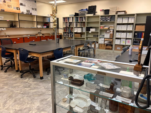 lab room with table and display case