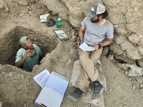 Ken Adams, Desert Research Institute, discusses the stratigraphy at Leonard Rockshelter, Nevada, with graduate student Richard Rosencrance (M.A., 2019).