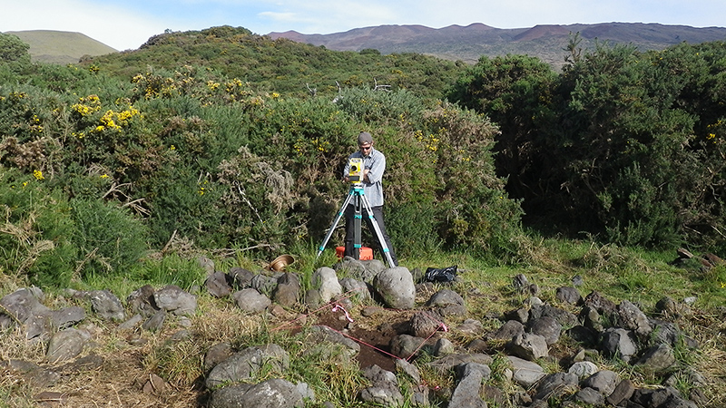 Graduate student performing field research