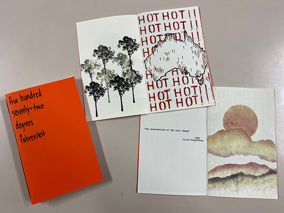 Red book cover with open pages showing images of Australia