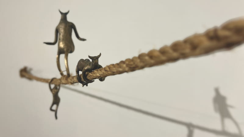 women looking at art exhibit