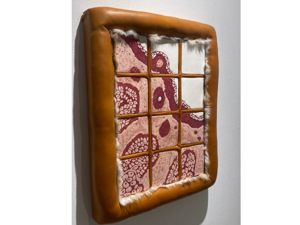 sculpture of windowpane with red, pink and white 