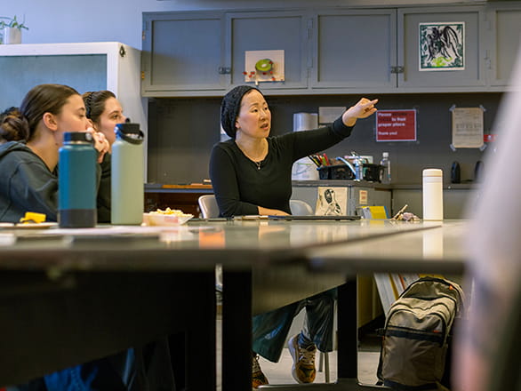 female professor talking with student
