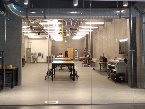 Fabrication Lab with tables and machinery
