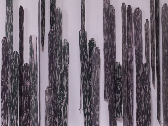 artwork of wooden skis hung on wall