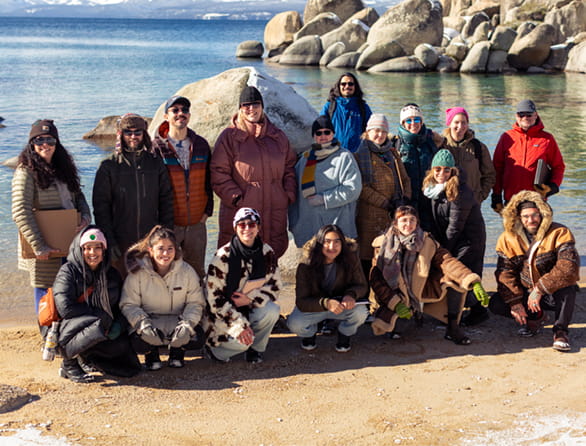 group of people on beach of Lake Tahoe