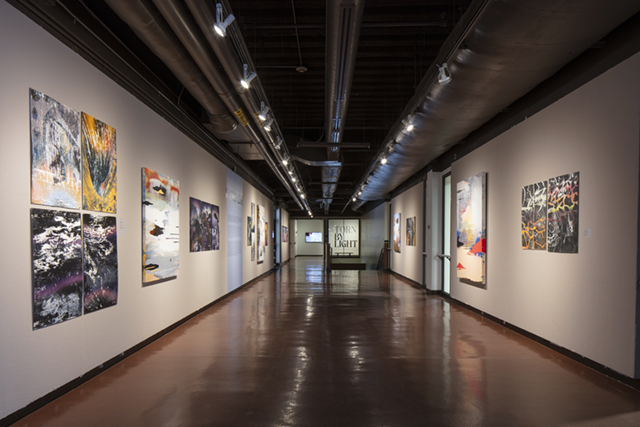 view of artwork in mcnamara hallway art gallery