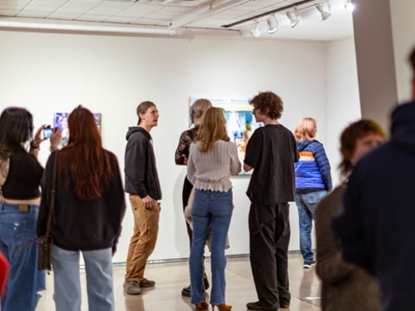 people standing in art gallery