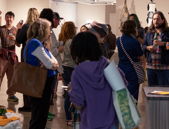 people gathered in art gallery