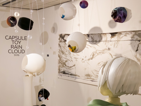 artwork orbs hanging from ceiling