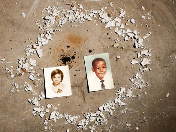 photographers surrounded by white circle on dirt