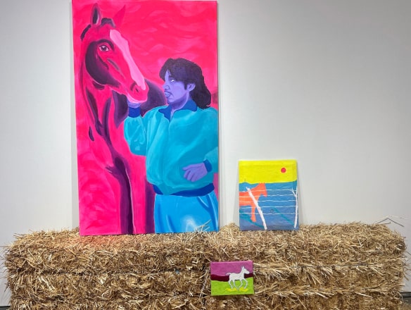 painting of pink horse with man in blue suit on bail of hay