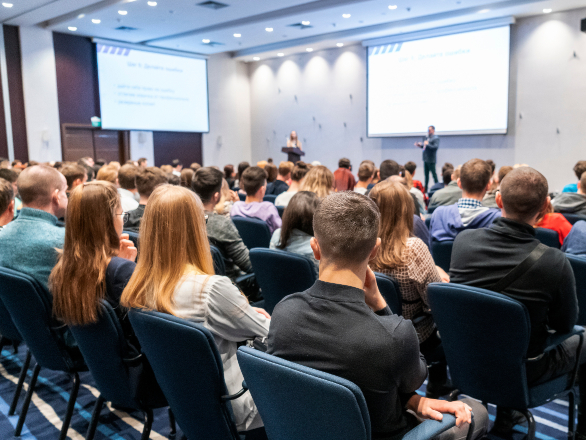 people sitting in audience at lecture