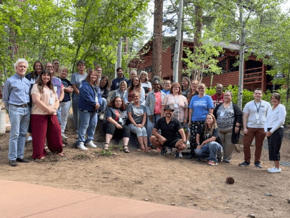 group of people smiling at Lake Tahoe campus