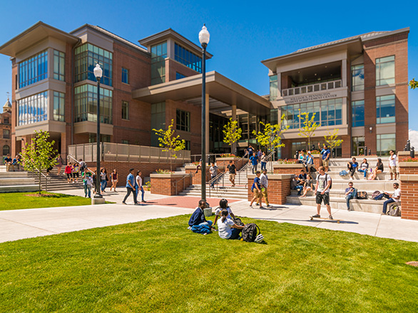 Students outside the Pennington Achievement Center during summer day