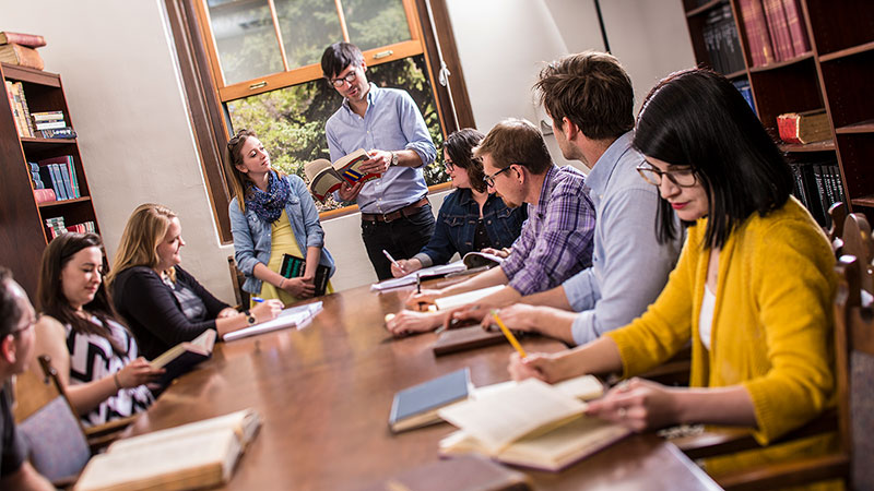 Students and professor in small class