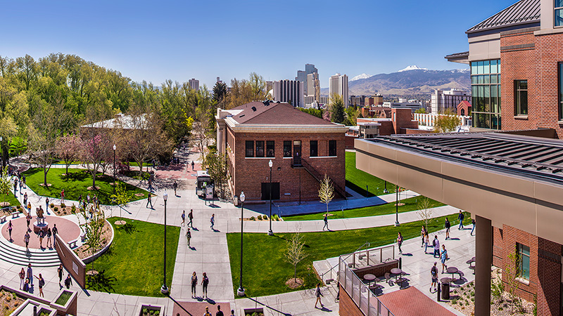 View of buildings and walking paths on south campus in the summertime