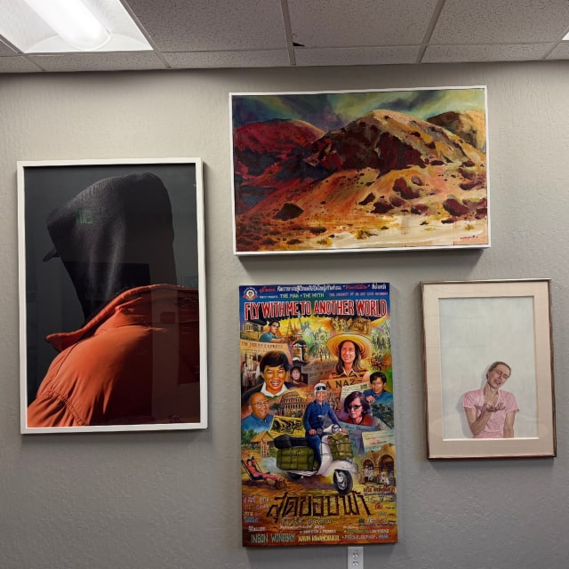 four art pieces on wall