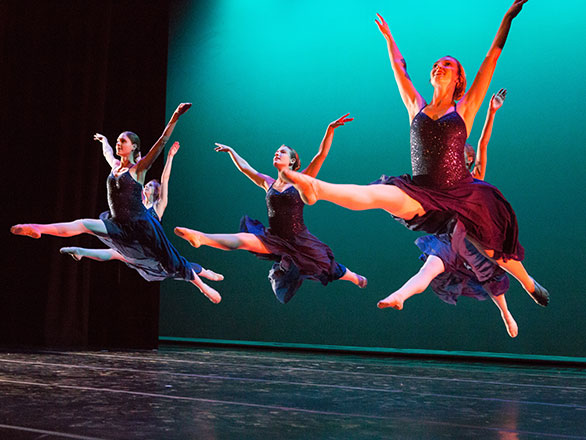 Dancers performing on stage