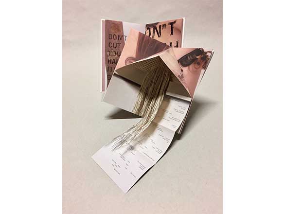 Book unfolded and stands as a sculpture piece