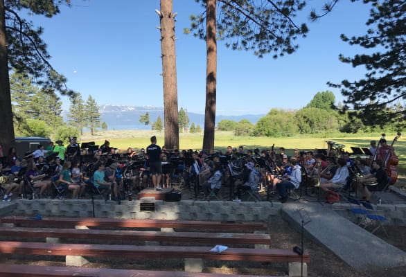 outdoor ampitheatre at Lake Tahoe Music Camp with kids playing instruments