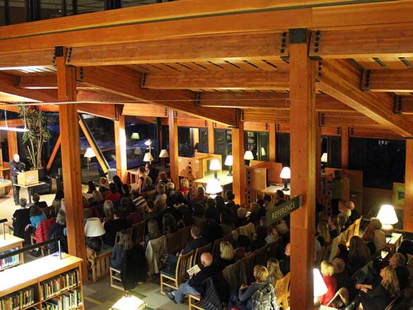 An audience gathered in the Prim Library for a reading