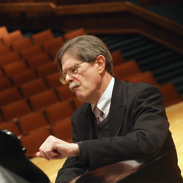 James Winn at a piano.