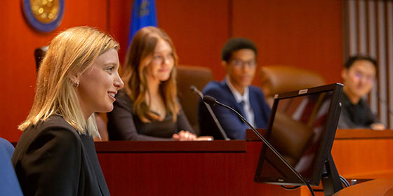 People sitting in courtroom during trial