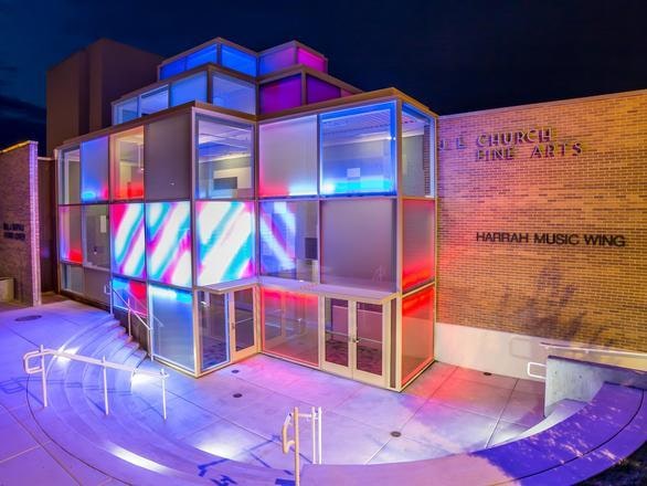 exterior of church fine arts building lit up