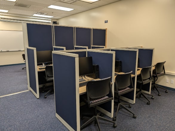 room with computer cubicles