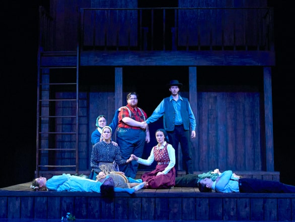 people acting on stage