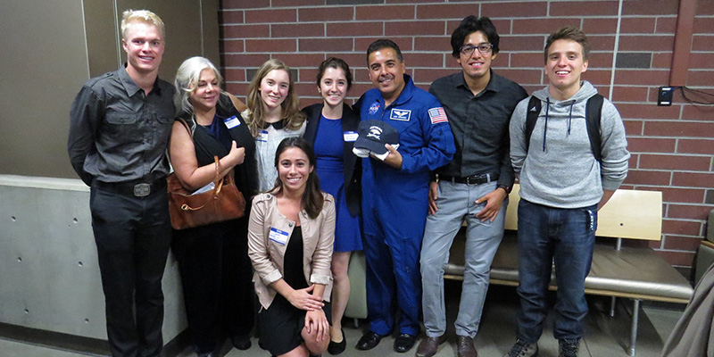 Spanish club members pose with a NASA astronaut