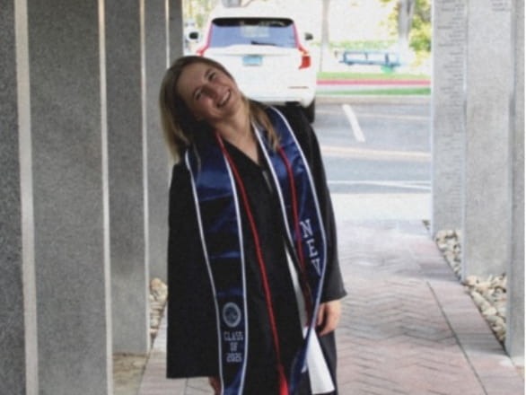 anna shultze in graduation stole