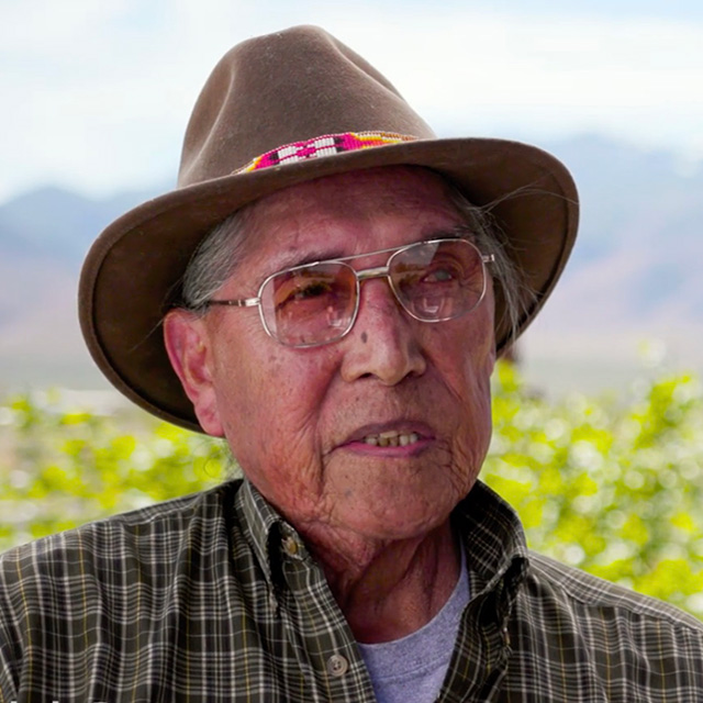 Headshot of Elder Ralph Burns wearing a hat