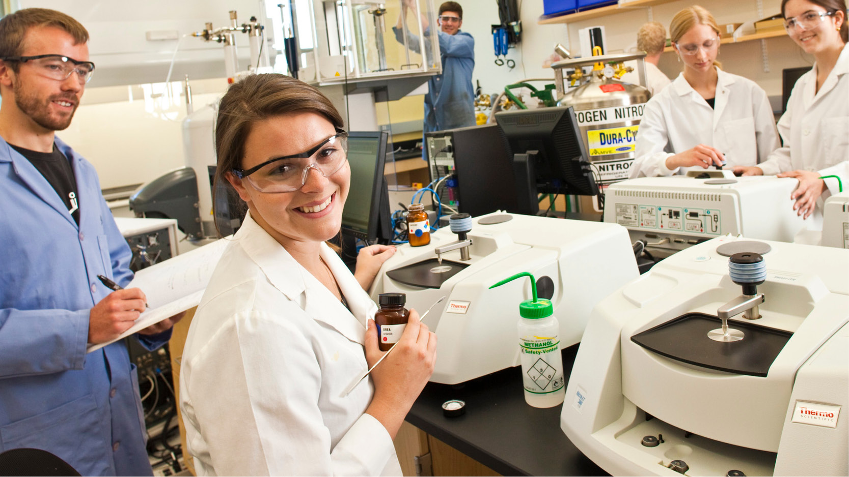 Students in a lab performing testing