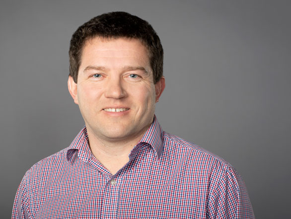 Headshot of Sergey A. Varganov against a building.