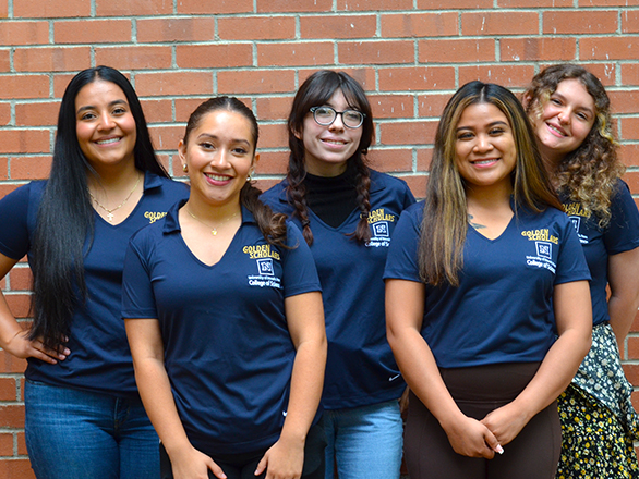 Golden Scholars mentors in University apparel.