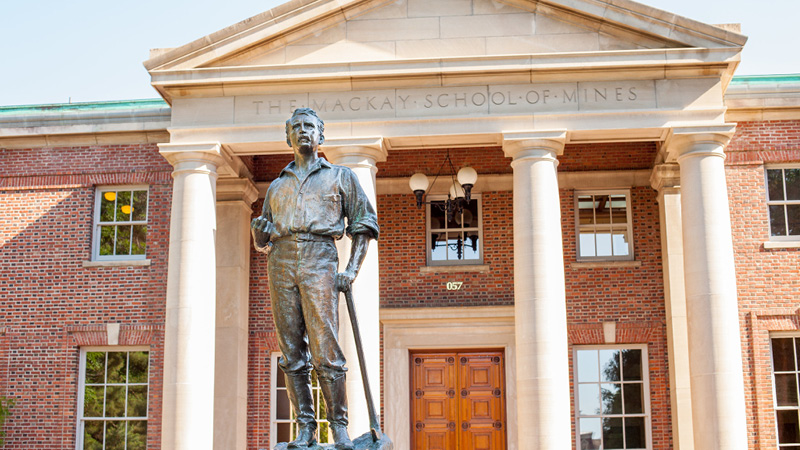 Mackay statue in front of the Mackay Mines building on the University campus.