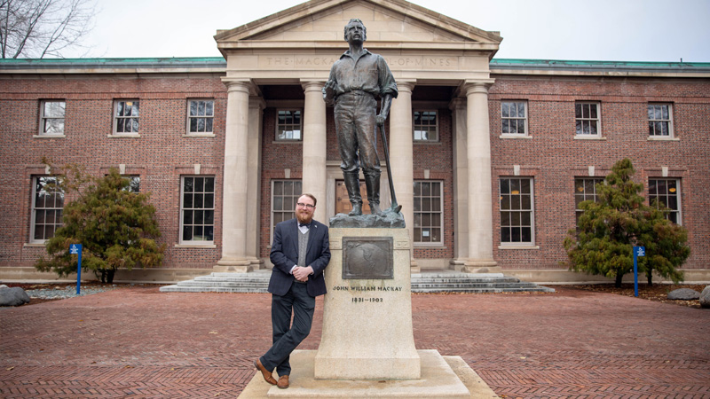 Garrett Barmore standing out front of the Mackay Mines building
