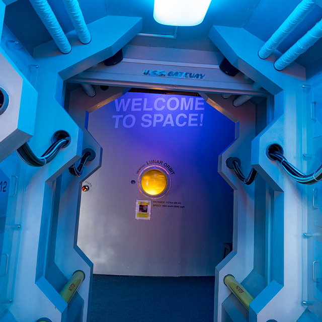 Space hallway leading to Exhibit Hall in the Fleischmann Planetarium and Science Center.