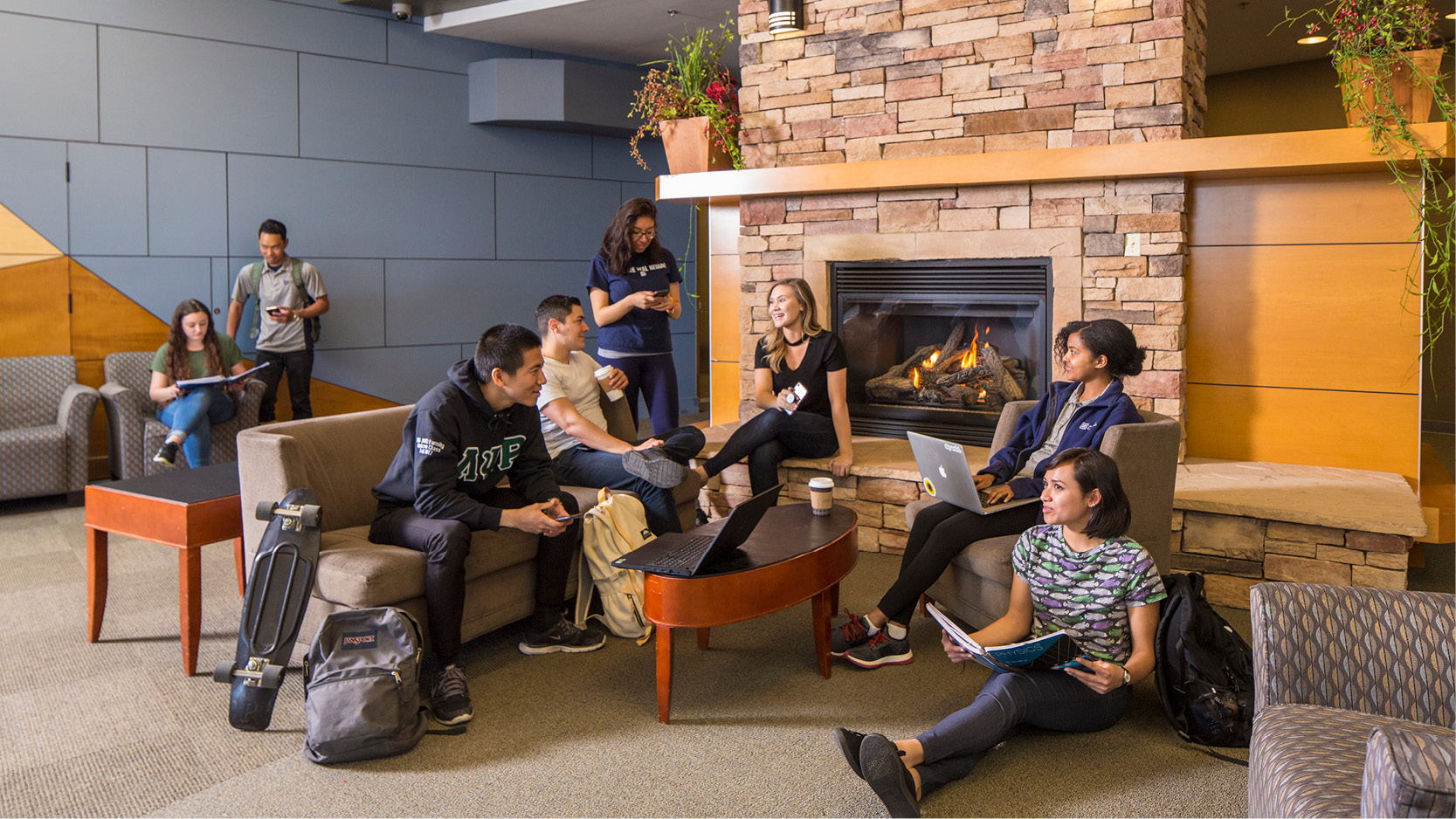 Students mingling with one another on campus